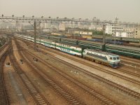 SS8 with a southbound passenger train. Shenzhen, China.