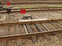 Remote track derail & flag in the Guangzhou passenger coach yard.