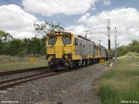 Electric traction leading a frieght train.