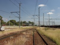 Walking up toward electric loco depot and looking back at Captial Park station.