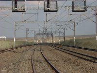 Headlight seen on horizon, train coming!.