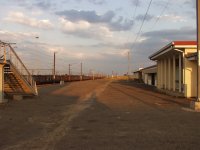 Station building and walkbridge.