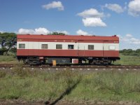 A caboose on a nearby siding.