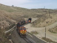 BNSF light unit move emerging from tunnel #3.